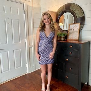 Jovani Form Fitting Embellished Plunging Neck Short Dress. Style: 63899